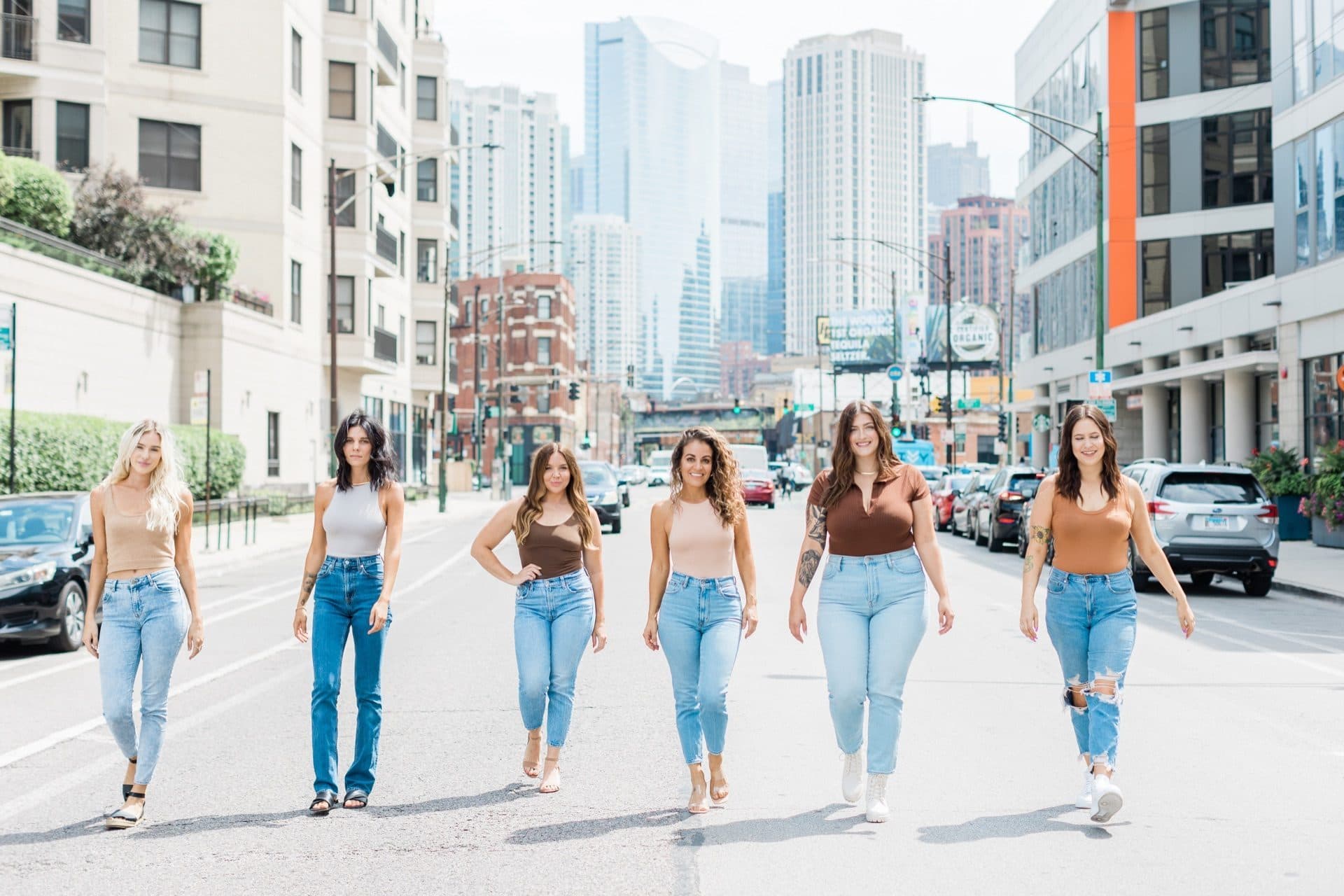 The team standing together in a downtown Chicago street